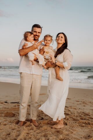 Family photography session at sunset on the beach Family photography session at sunset on the beach
